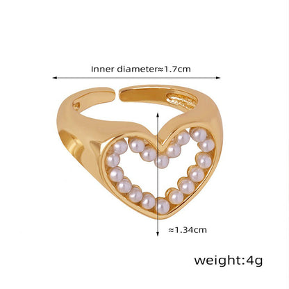 18K gold exquisite and novel hollow love heart inlaid pearl design ring